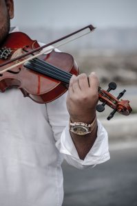 image of someone playing a violin