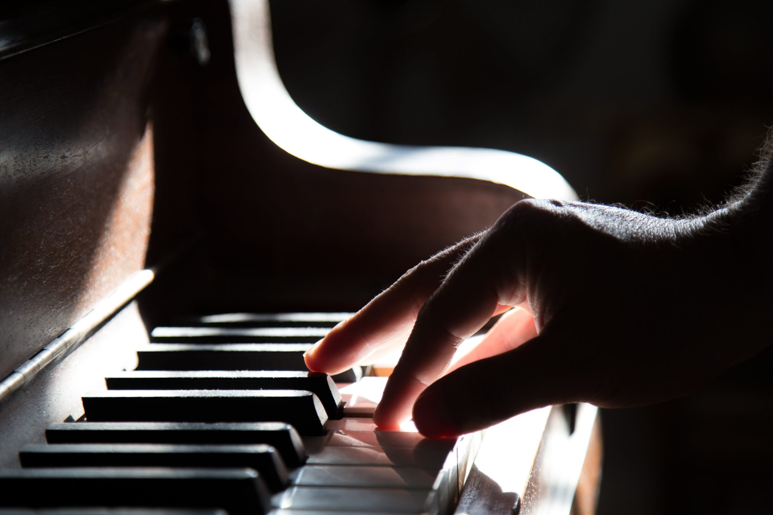 image of someone playing a piano