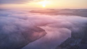 sunset over a river blanketed in clouds, why it's important to keep learning and how to do it